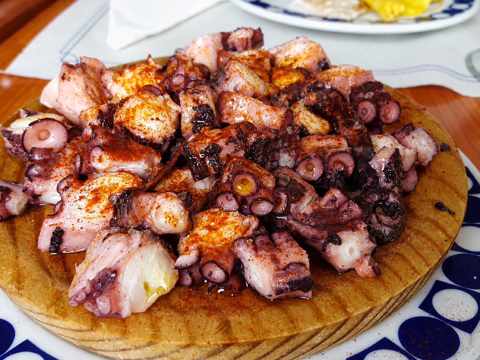 Galician-style octopus on a wooden platter